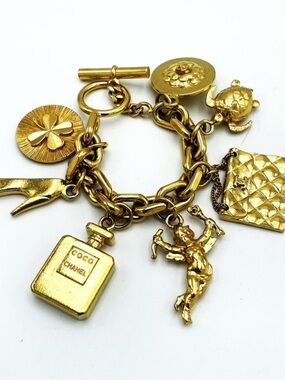 CHANEL Gold-Tone Charm Bracelet with Coco Perfume & Quilted Bag Charms
